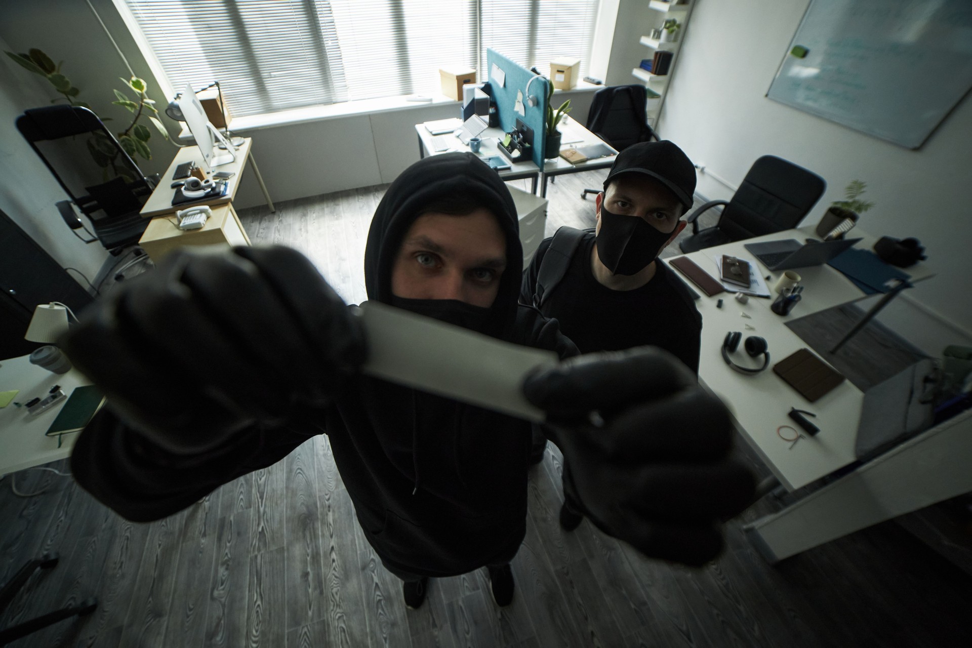 Two Male Crime Perpetrators in Masks Breaking into Office and Disabling Camera